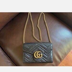 Gucci Marmont black leather crossbody wallet bag.